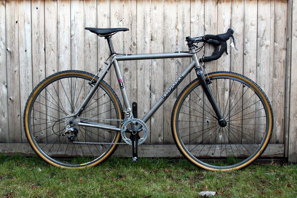 Raw Titanium Planet Cross